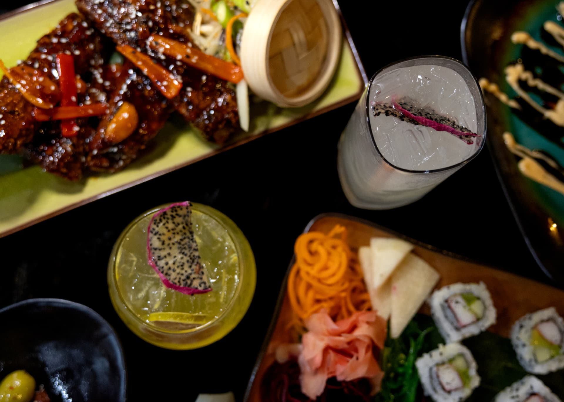 Glazed ribs, sushi and dragonfruit-garnished cocktails