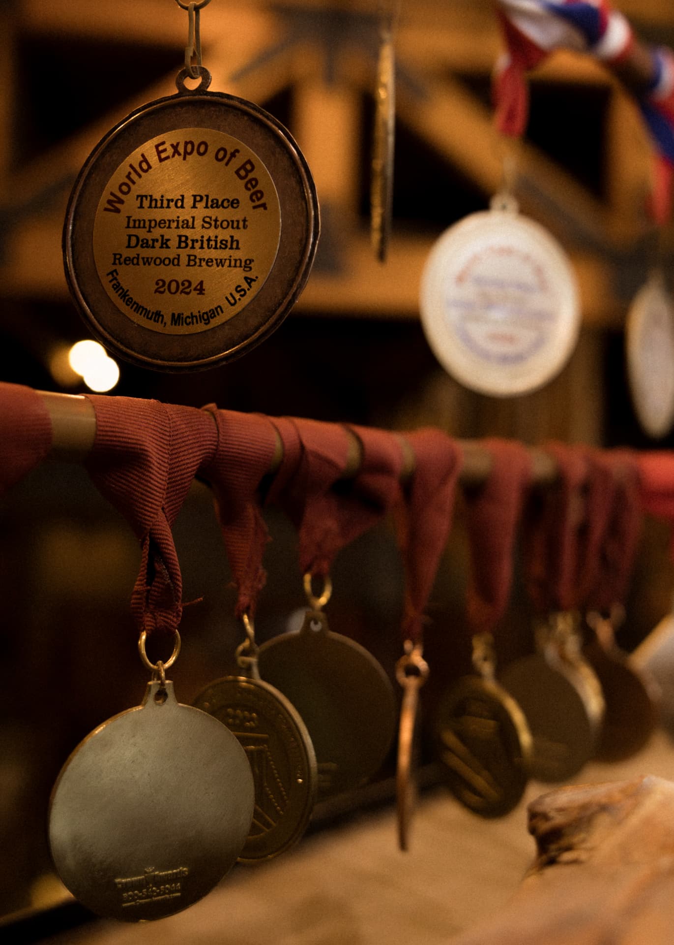 World Expo of Beer medals hanging in the Redwood brewery